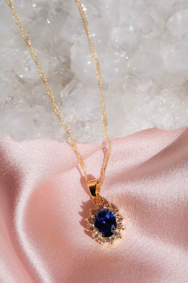 Necklace with blue and white stones