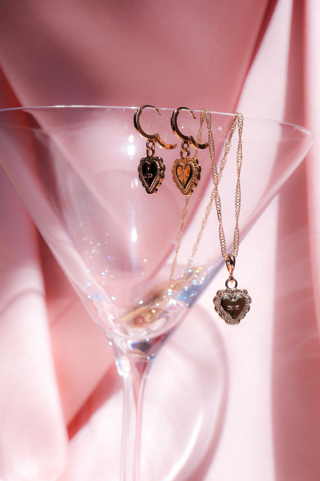heart earrings with cross engraving